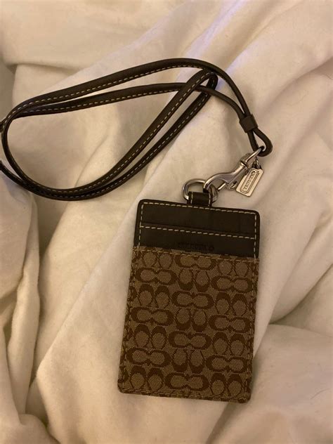 coach outlet badge holder.